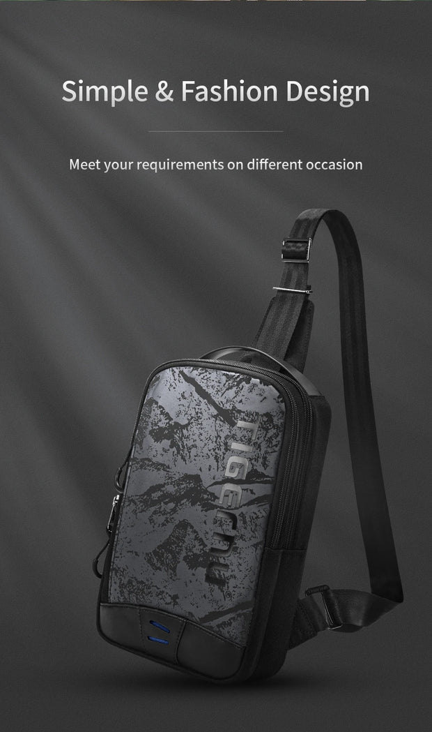 Black sling bag with camouflage pattern on a dark background