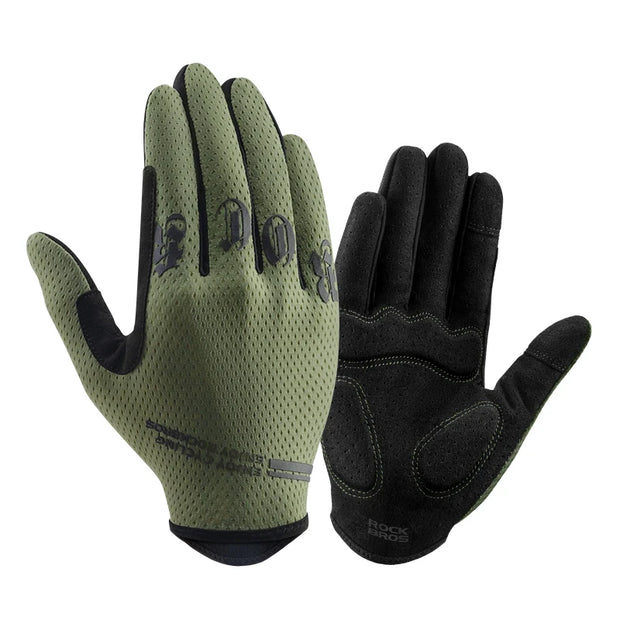 Pair of green and black gloves on a white background