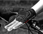 Black and white glove with a brand logo on a blurred background