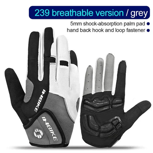 Pair of black and gray gloves on a white background