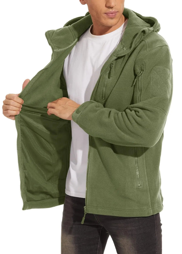 Person wearing a green jacket with a hood on a white background