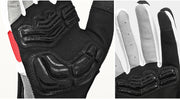 Black motorcycle glove with red accents and detailed padding on a white background