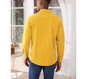 Person wearing a yellow shirt 