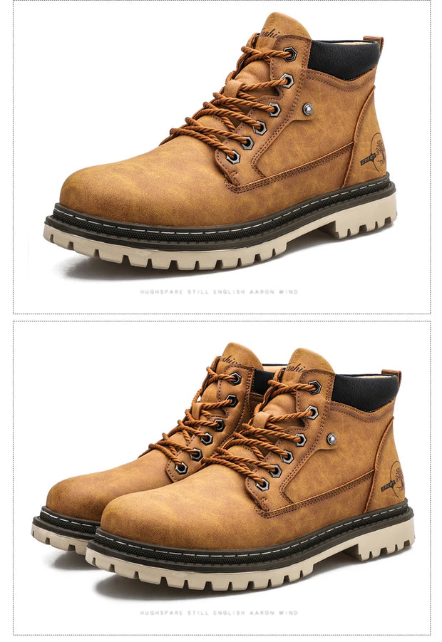 Pair of brown work boots with white soles on a white background