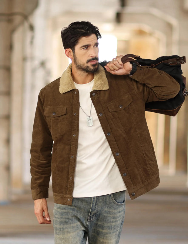 Man wearing a brown jacket with a blurred background