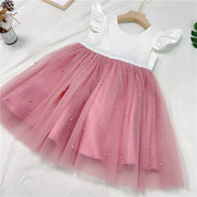 Pink and white dress with a tutu skirt on a white background