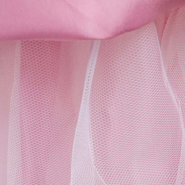 Close-up of pink fabric with a mesh texture