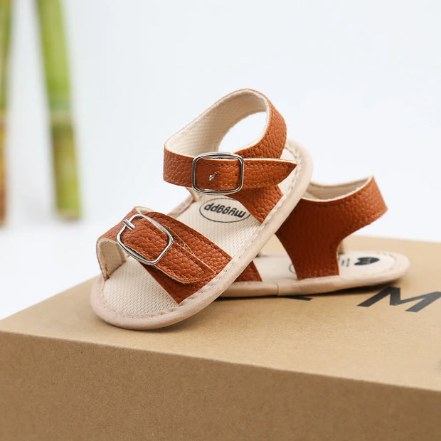 Flower Accent Baby Sandals – PU Leather Soft Sole Anti-Slip First Walkers (0–12 Months) Baby Sandals ZURRIES BILLINERY (PVT) LTD.