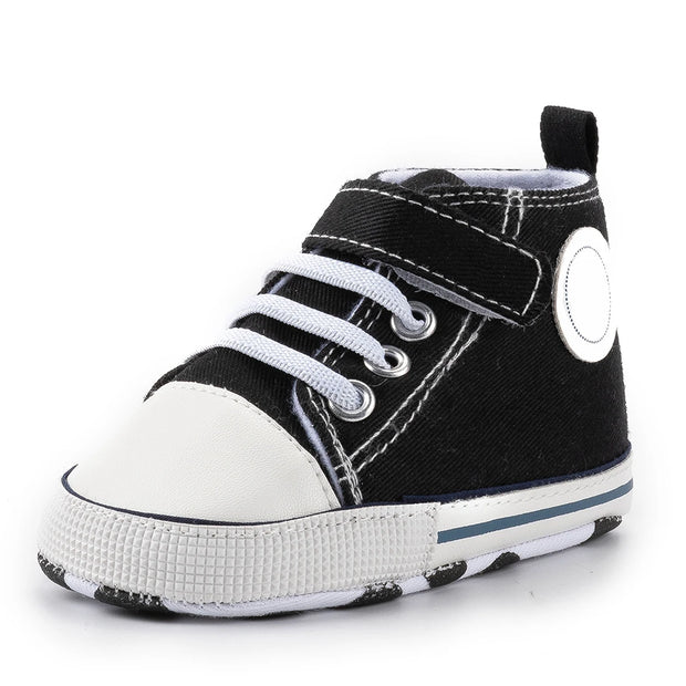 Black and white high-top sneaker on a white background