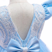 Light blue dress with lace detailing on a mannequin against a white background