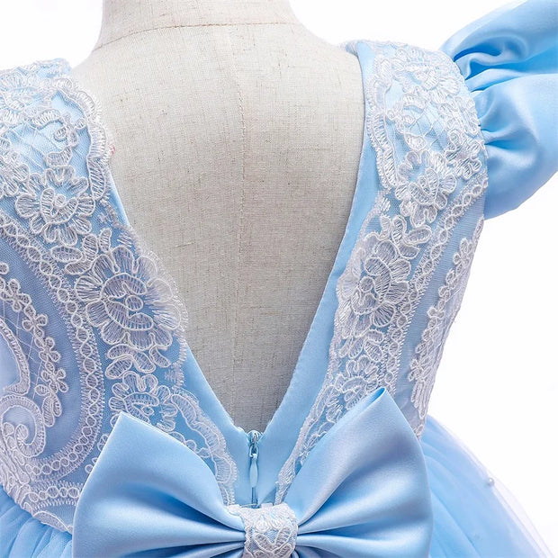 Light blue dress with lace detailing on a mannequin against a white background