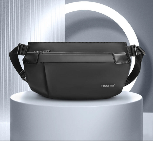 Black shoulder bag on a gray background
