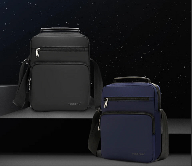 Two backpacks, one gray and one blue, against a dark starry sky background.
