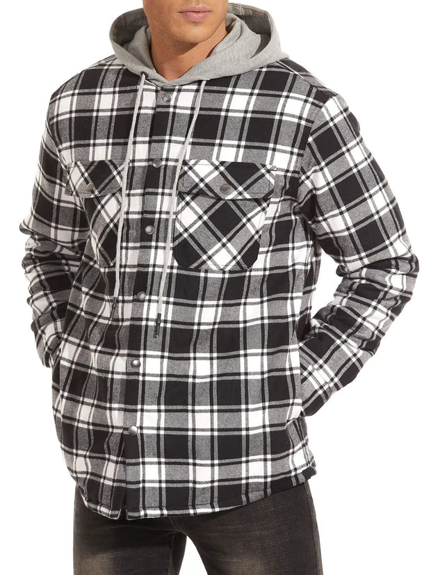 Person wearing a black and white plaid hoodie on a white background