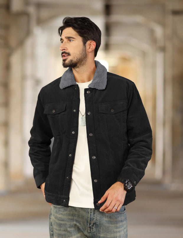 Man wearing a black jacket with a blurred background