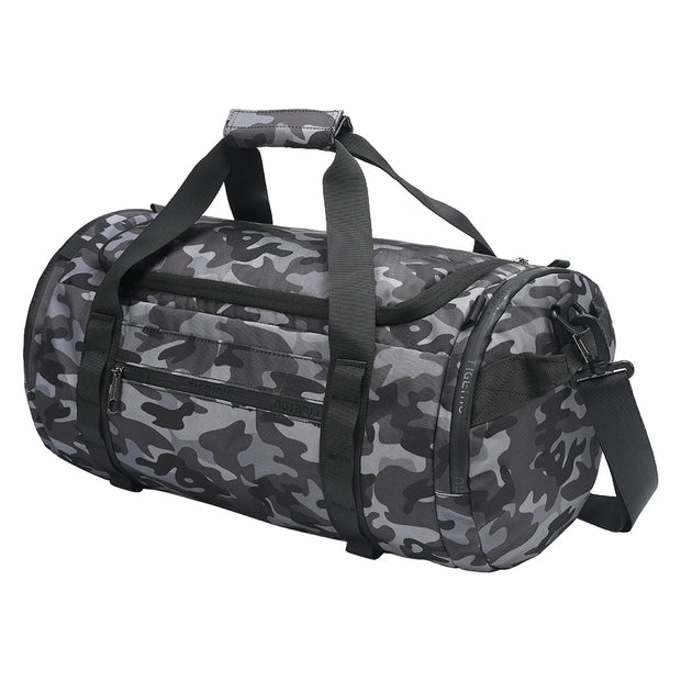 Camouflage duffel bag with black straps on a white background