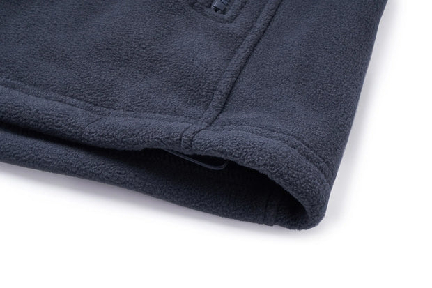 Close-up of a dark blue fleece fabric on a white background
