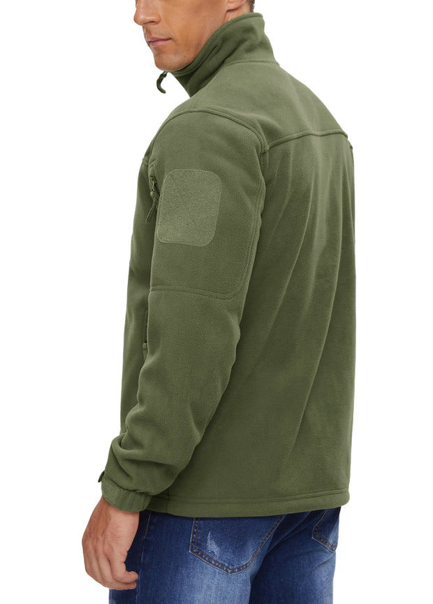 Person wearing a green fleece jacket with a patch on a white background