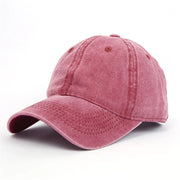 Pink baseball cap on a white background