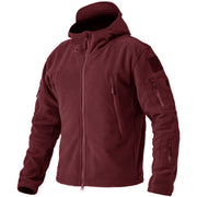 Maroon tactical jacket with multiple pockets and zippers on a white background