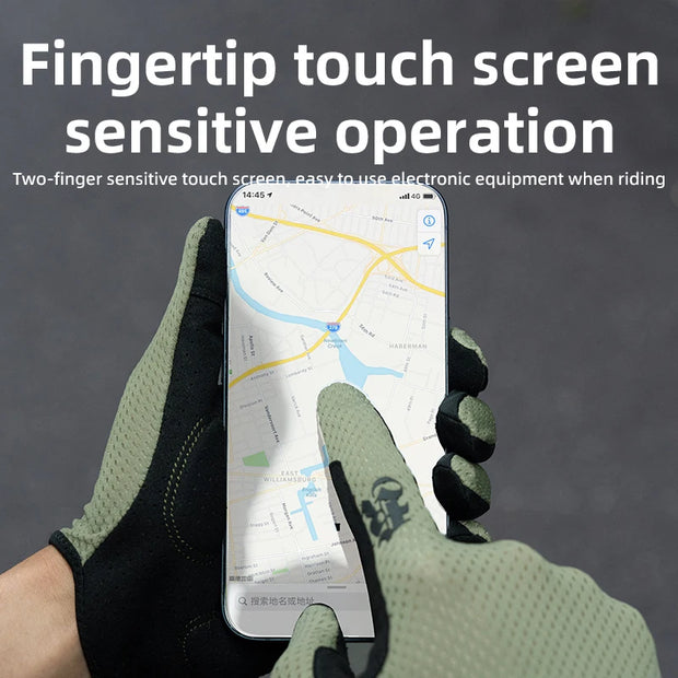 Person wearing gloves using a smartphone with a map app, text indicating fingertip touch screen sensitivity.