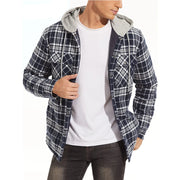 Person wearing a plaid jacket with a hood, white shirt, and dark jeans on a white background.