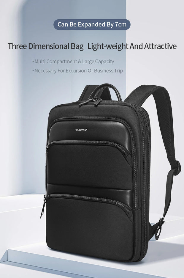 Black backpack with expandable feature on a light blue background