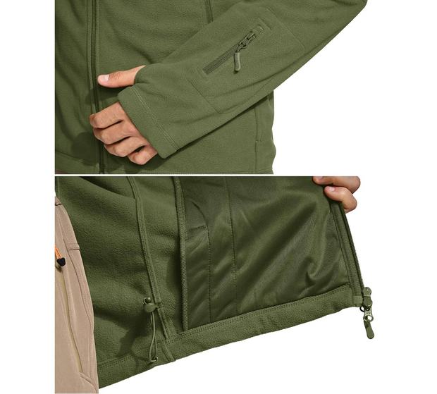 Green jacket with zippers and a hand interacting with it
