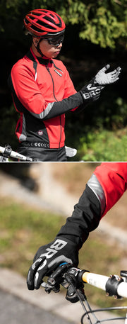 Cyclist in red and black gear with gloves on a blurred background