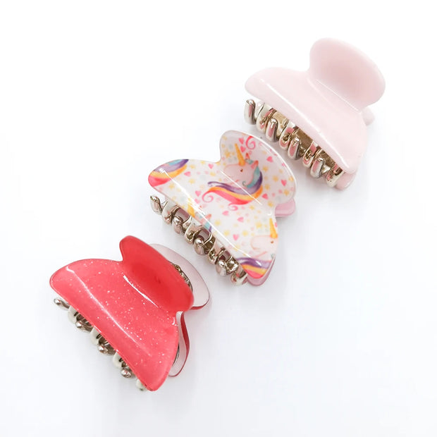 Colorful hair clips on a white background