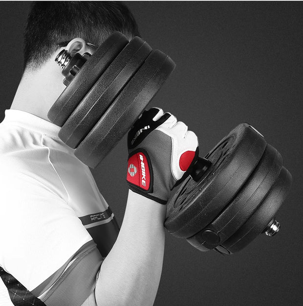 Person lifting a pair of dumbbells with a focus on the equipment.