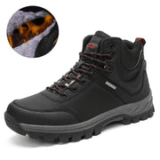Black hiking boot with red accents on a white background, showing fur lining detail.
