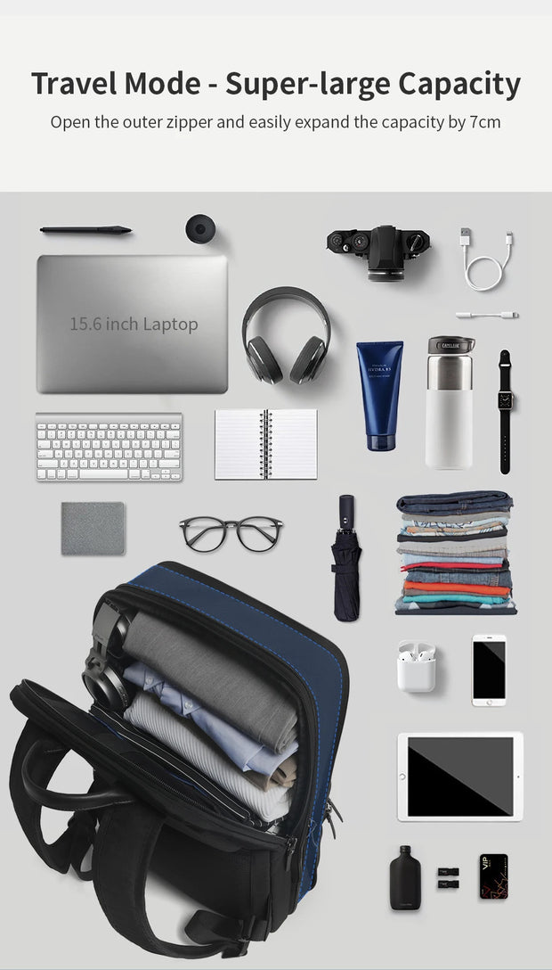 Travel mode bag with various travel items on a light gray background
