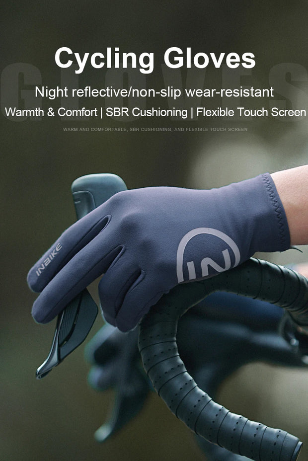 Cycling gloves with reflective and non-slip properties, held by a person on a blurred background.