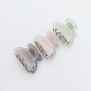 Three crystal hair clips on a white background