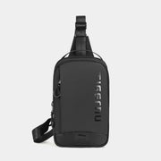 Black sling bag on a light gray background