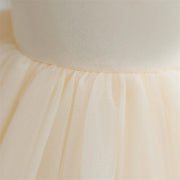 Close-up of a beige fabric with a textured surface