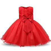 Red dress with a large bow on a white background