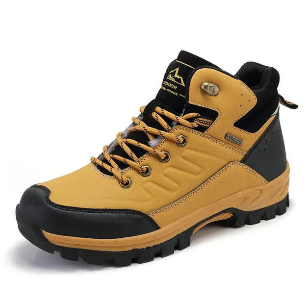 Yellow and black hiking boot on a white background