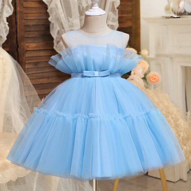 Light blue tulle dress on a mannequin against a neutral background