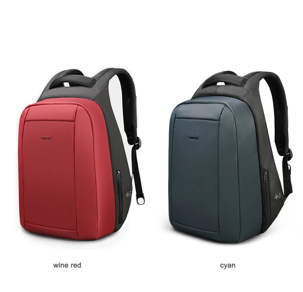 Two backpacks, one red and one cyan, on a white background