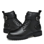 Black leather boots with buckles on a white background