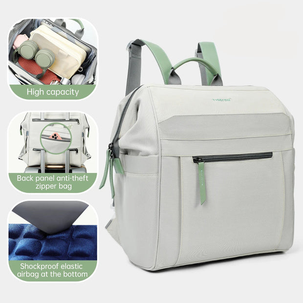 Gray backpack with green accents, on a light gray background.