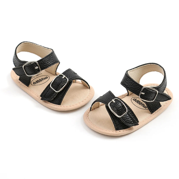 Flower Accent Baby Sandals – PU Leather Soft Sole Anti-Slip First Walkers (0–12 Months) Baby Sandals ZURRIES BILLINERY (PVT) LTD.