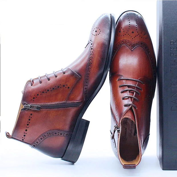 Brown leather shoes with a box on a white background