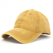 Yellow baseball cap on a white background