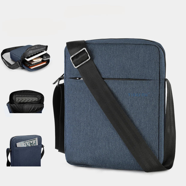 Blue tablet bag with black strap and accessories on a white background, 