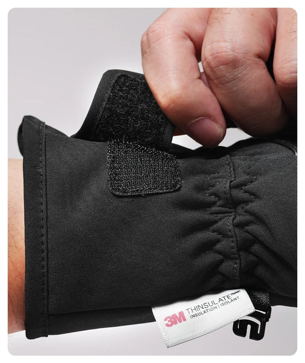 Black glove with Thinsulate insulation and 3M branding on a gray background