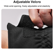 Black glove with adjustable velcro strap on a white background