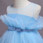 Light blue dress on a mannequin with a plain background